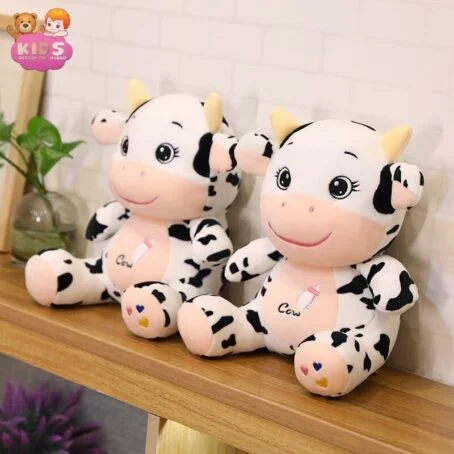 Vache en peluche pour bébé brodée