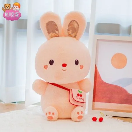 Jolis jouets en peluche rose lapin