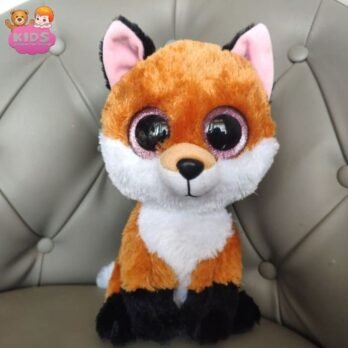 Renard En Peluche Avec De Grands Yeux Noirs