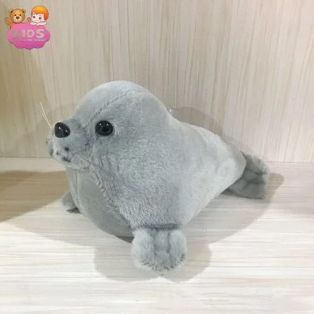 Jouet en peluche de phoque gris