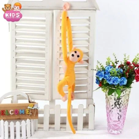 Singe en peluche jaune à longue queue Kawaii